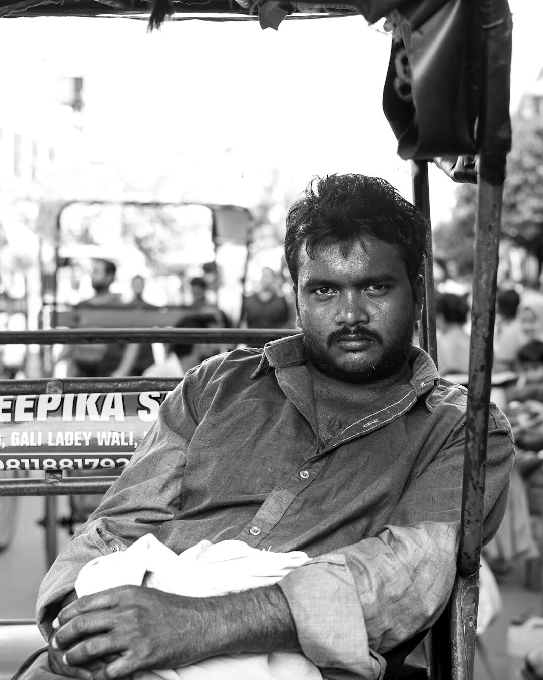 Portrait of a South Asian man with glasses and a neat beard